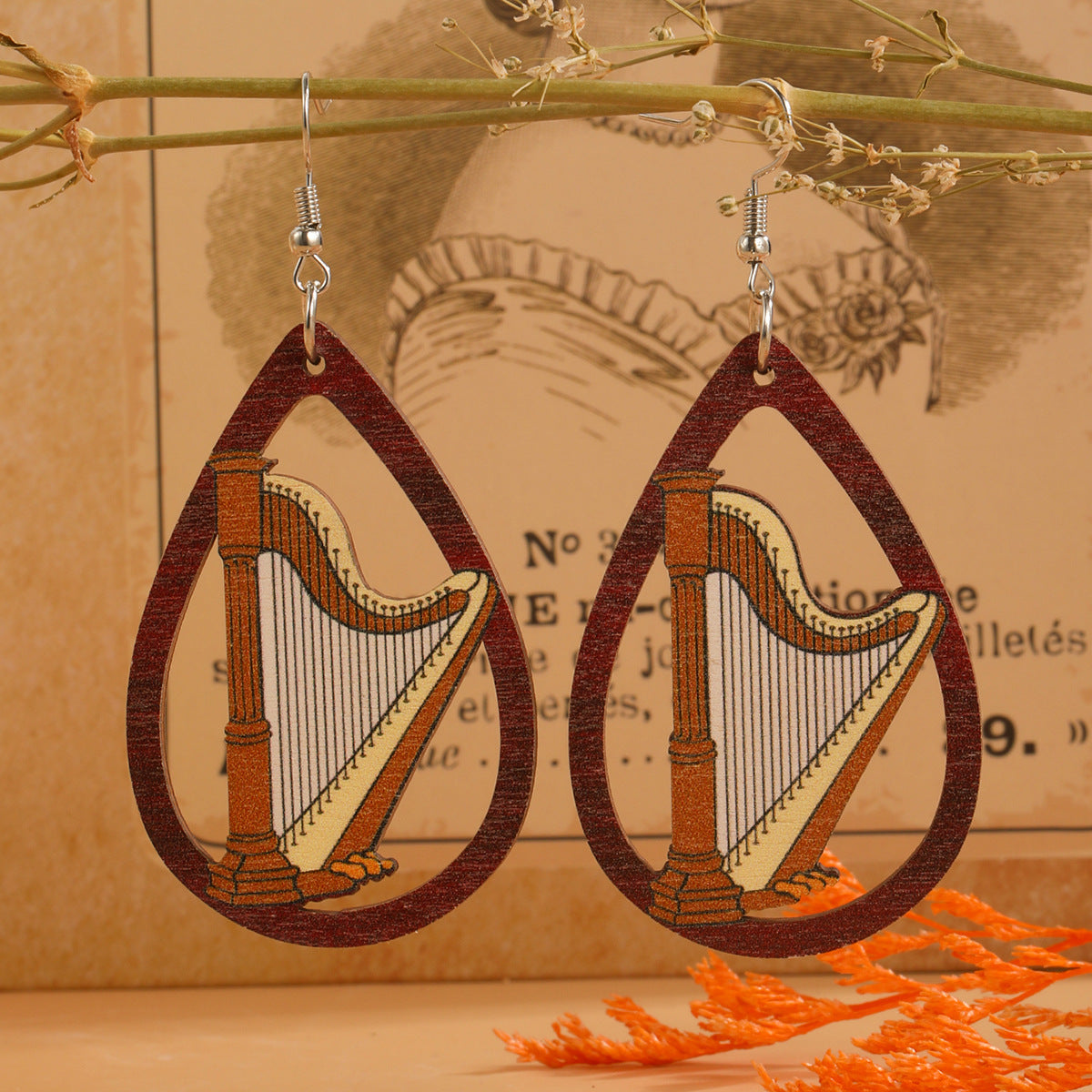 Guitarra de agua de agua al por mayor arpa acordeón estampado de madera aretes de madera